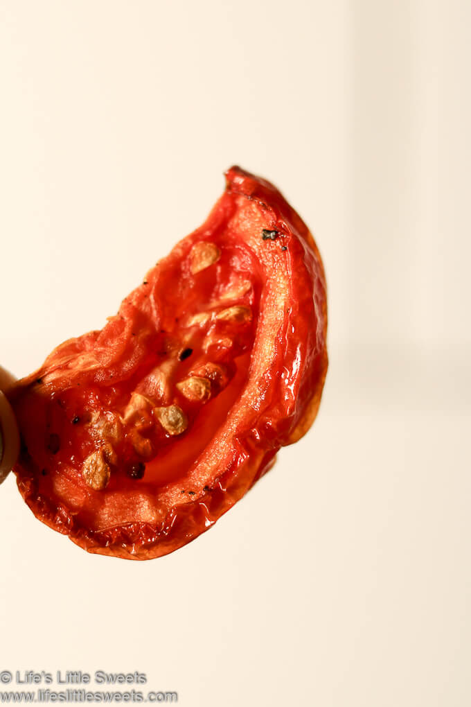 Air Fryer “Sun-Dried” Tomatoes are so easy to make in your Air Fryer! These tart, sweet, slightly acidic and flavorful dried tomatoes are delicious to snack on, in salads, sauces, pizzas, pastas – you name it! Add instant flavor with these delicious tomatoes that are also very good for you! #tomatoes #airfryer #sundriedtomatoes #sides #topping #fruit #recipe www.lifeslittlesweets.com