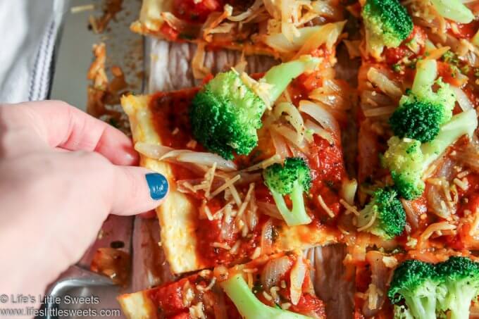 Broccoli Garlic Onion Chicken Crust Pizza is a savory, low carb pizza, packed with protein-rich chicken and cheese and topped with red pizza sauce, broccoli, onions, garlic and Parmesan cheese. Every bite will leave you feeling satisfied. #chickencrustpizza #pizza #Keto #broccoli #garlic #onion #Paleo #garlic www.lifeslittlesweets.com