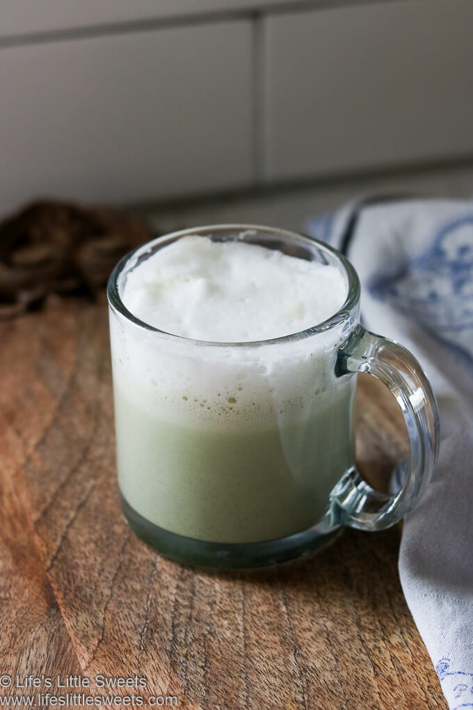 Matcha Green Tea Latte on a wood cutting board