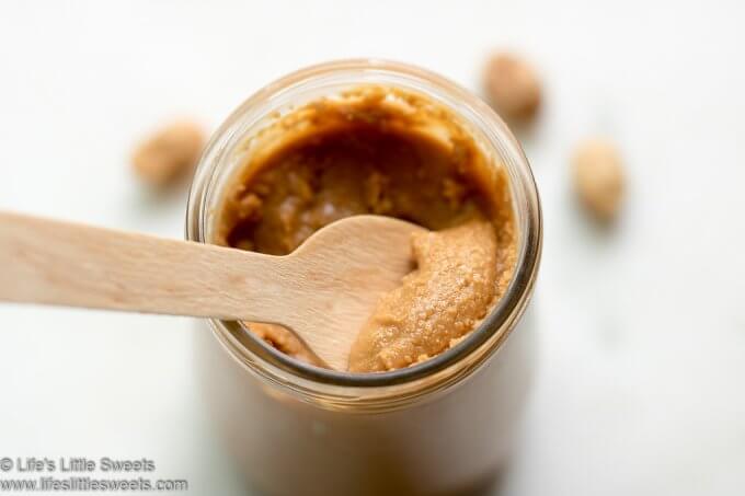 Peanut Butter with a wooden spoon
