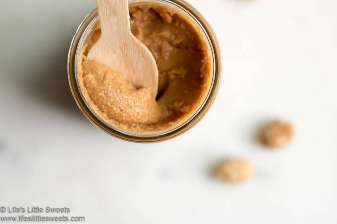 Peanut Butter with a wooden spoon