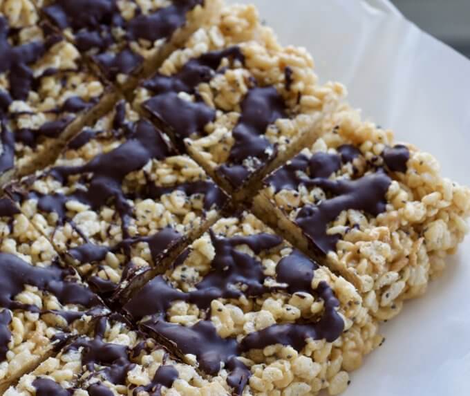 Almond Butter Rice Krispies Treats with chocolate drizzled on top