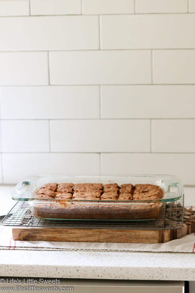 Oatmeal Raisin Cookie Bars cut in a 9x13-inch glass pan