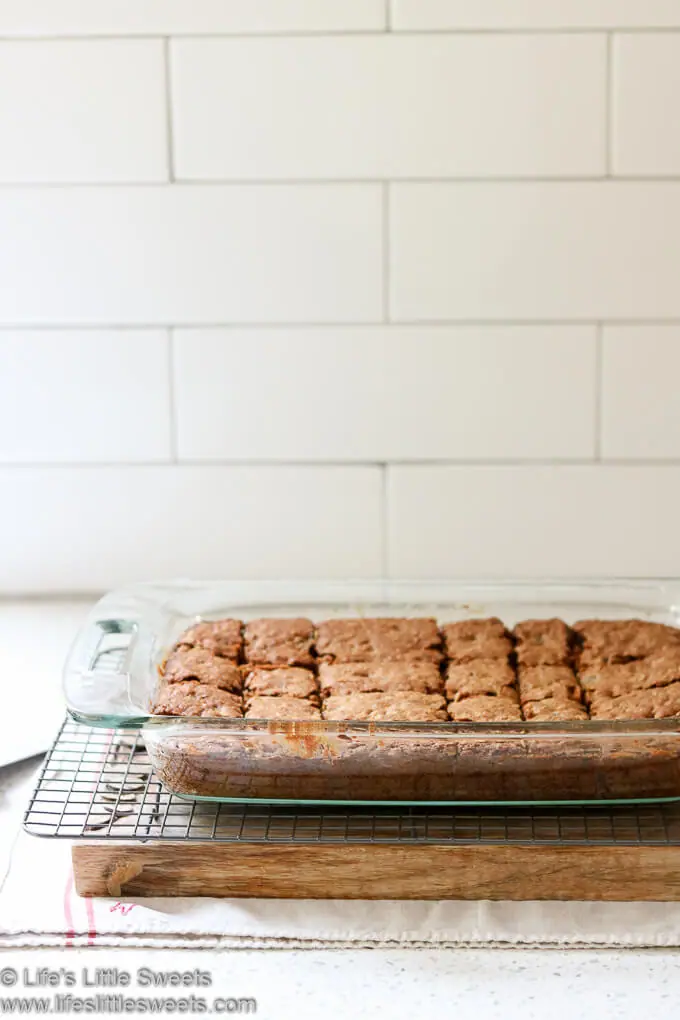 Oatmeal Raisin Cookie Bars cut in a 9x13-inch glass pan