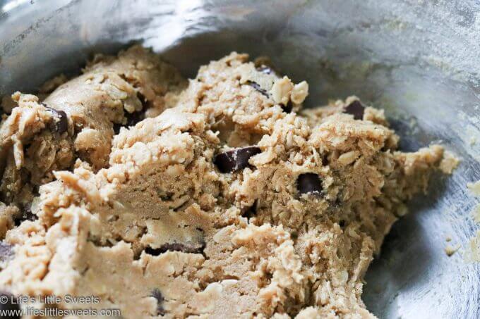 a bowl of cookie dough with chocolate chunks