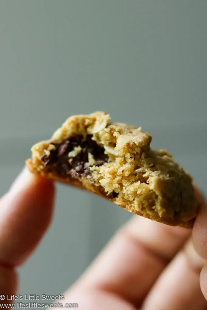 a close up of one cookie with a bite out of it