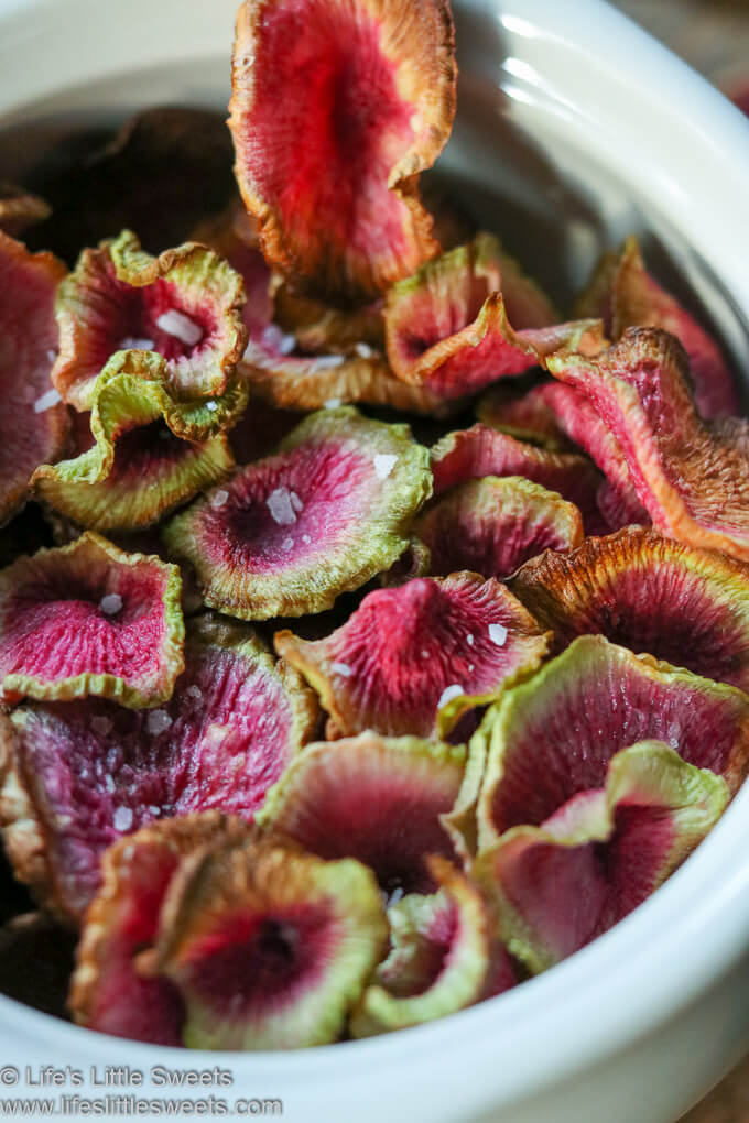 Air Fryer Watermelon Radish Chips in a bowl with salt