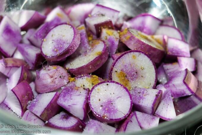 Roasted Radishes recipe process photo, raw radishes in a metal bowl with spices on top