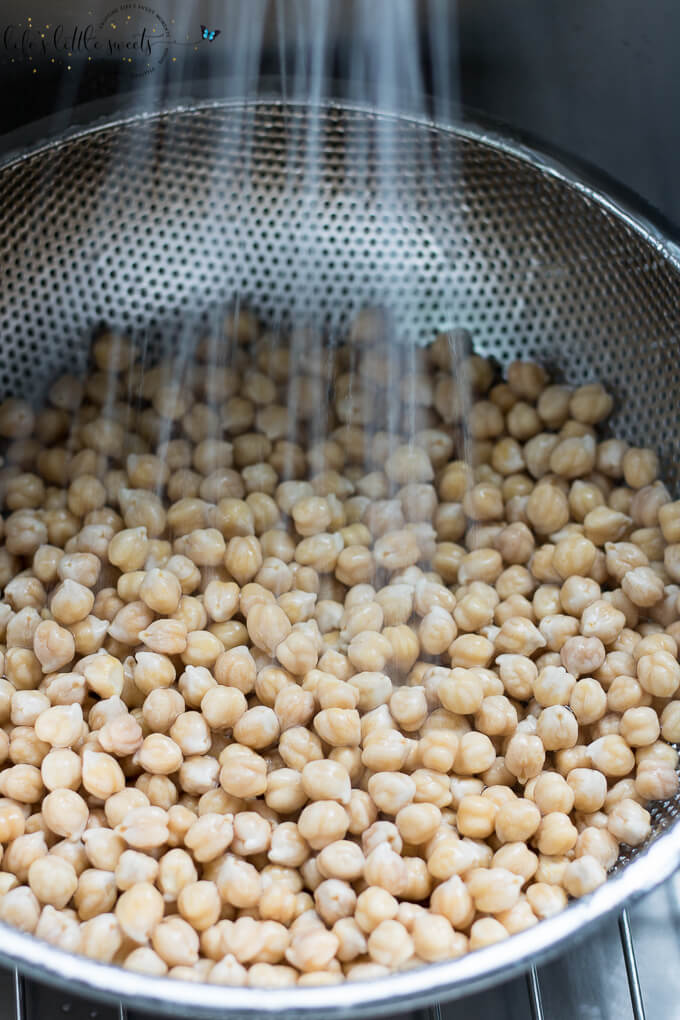 Instant Pot Chickpeas being rinsed