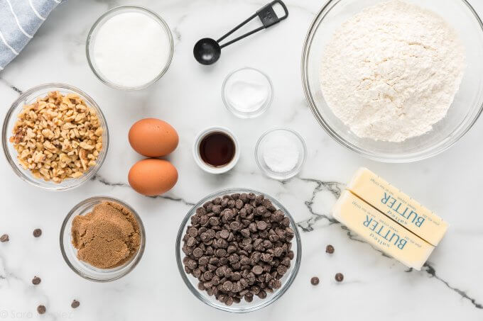 Ingredients for Chocolate Chip Cookies on a marble countertop