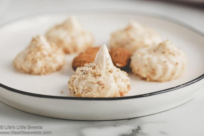 Almond Meringue Kisses on a white plate in a white kitchen