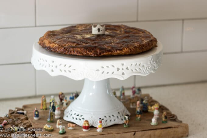 Galette Des Rois (King Cake) on a white cake stand