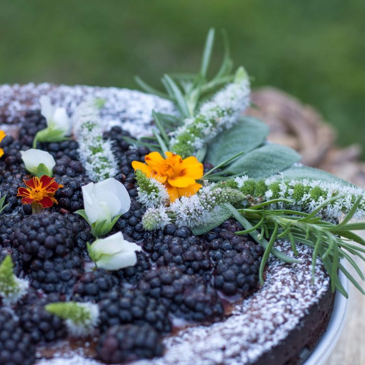 Flourless Chocolate Cake with Blackberries and Edible Flowers