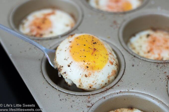 baked eggs in a muffin tin, taking one out