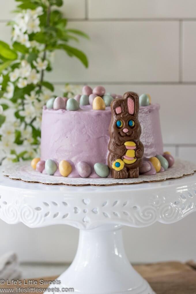 Easter Cake Recipe on a white cake stand