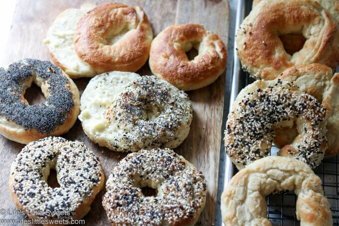 a homemade bagel with everything bagel seasoning, poppy and sesame seeds