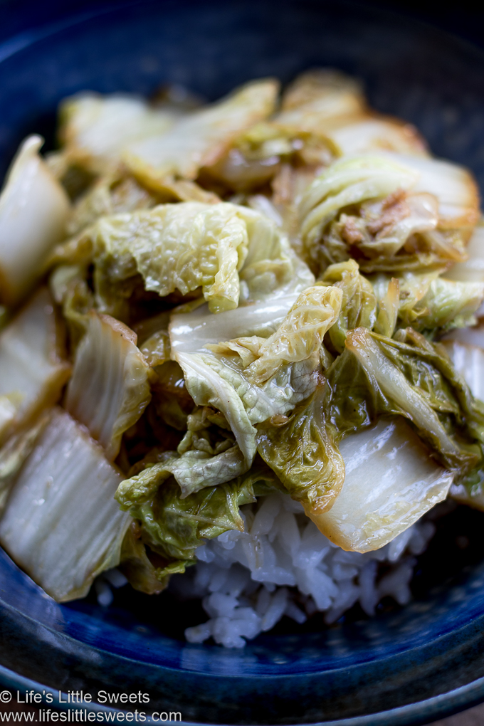 Stir-Fried Napa Cabbage in a blue bowl over steamed rice