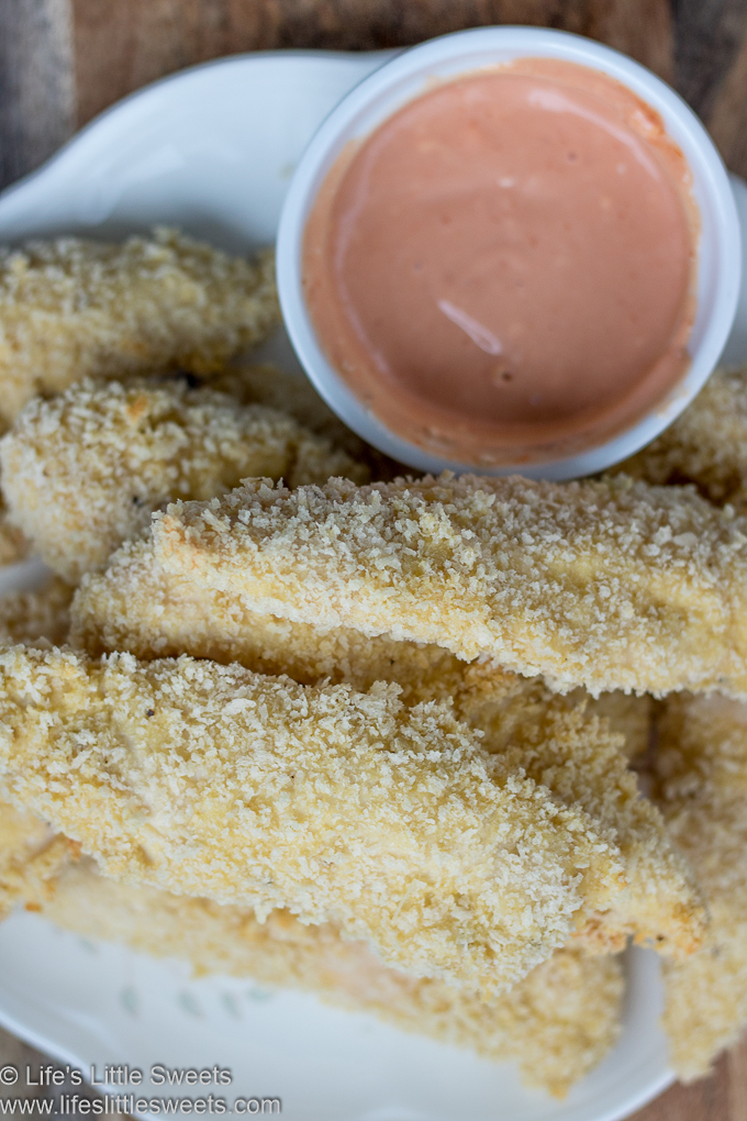 a plate of chicken tenders with fry sauce
