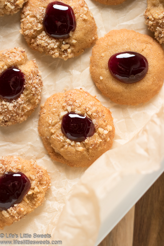 several of Grandma’s Perfect Jam Thumbprint Cookies in a tray