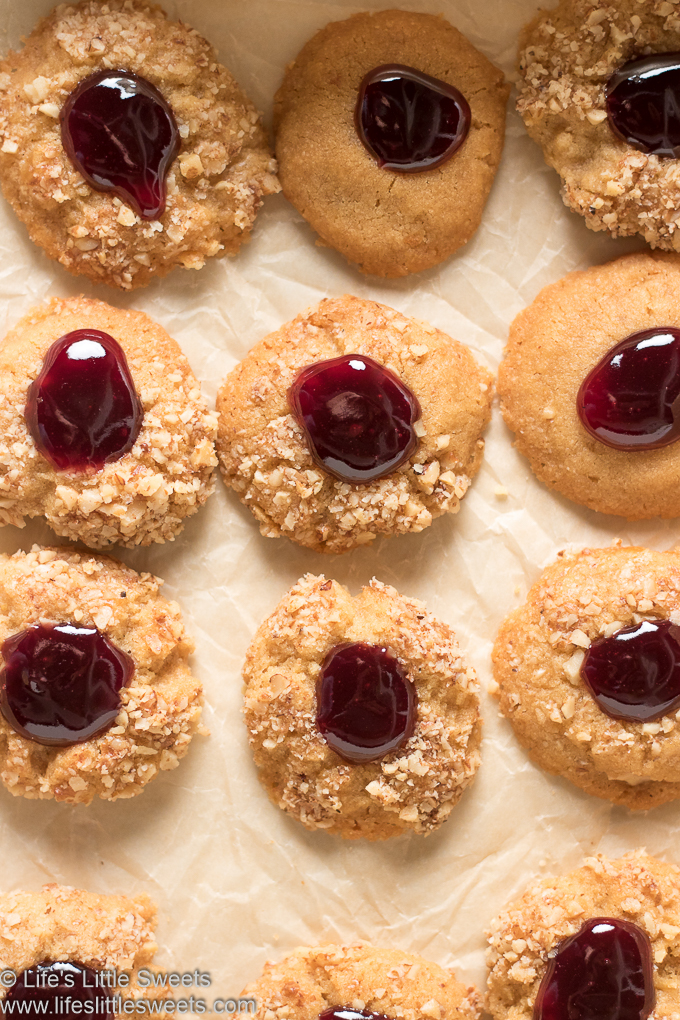 Grandma’s Perfect Jam Thumbprint Cookies on parchment paper