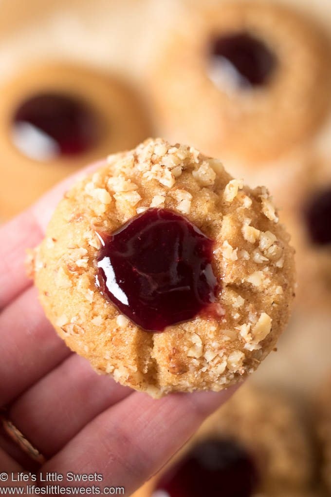 close up of Grandma’s Perfect Jam Thumbprint Cookies with grape jam