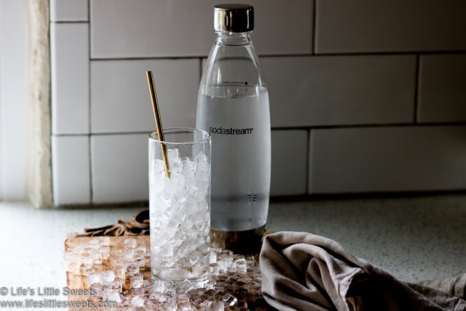 Seltzer water with bubbles and ice