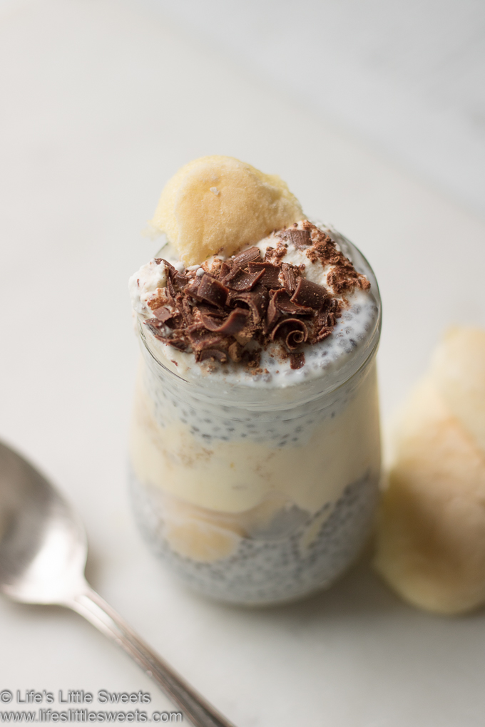 chia pudding layered with tiramisu with a spoon and ladyfingers