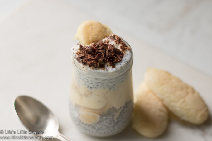 chia pudding layered with tiramisu with a spoon and ladyfingers