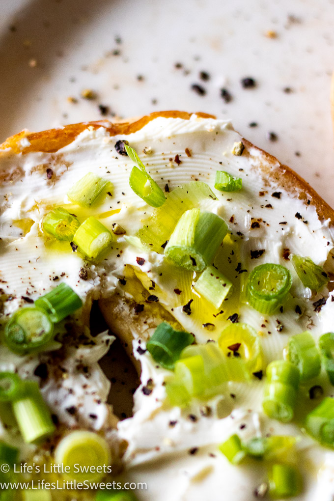 Bagel with Cream Cheese and Scallions close up