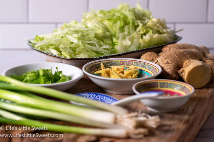 ingredients ginger, scallions and shredded iceberg lettuce