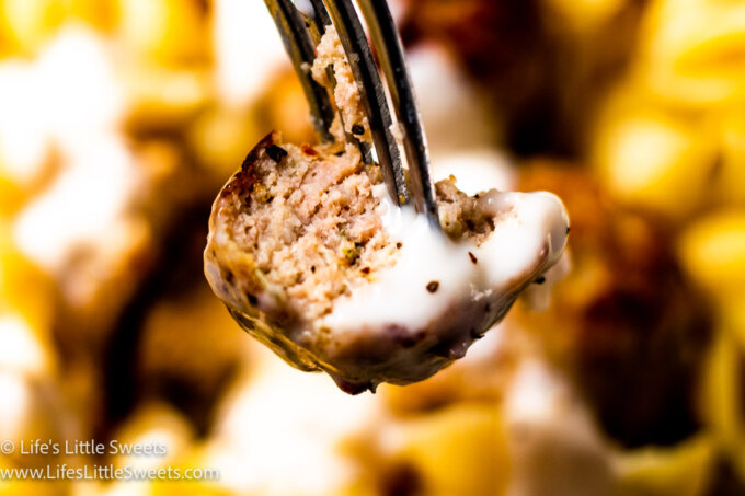 Turkey Meatball on a fork with white sauce