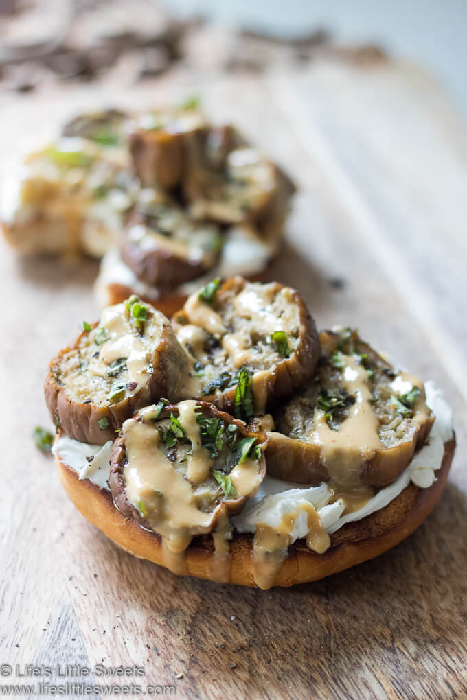 Bagel with Roasted Eggplant on a wood board