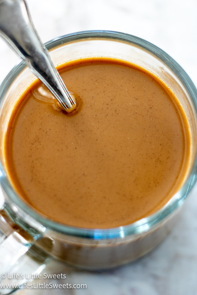 close up view of a glass mug of coffee