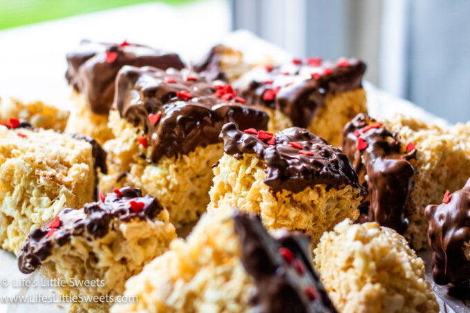 melty Chocolate-Dipped Rice Krispies Treats on a counter