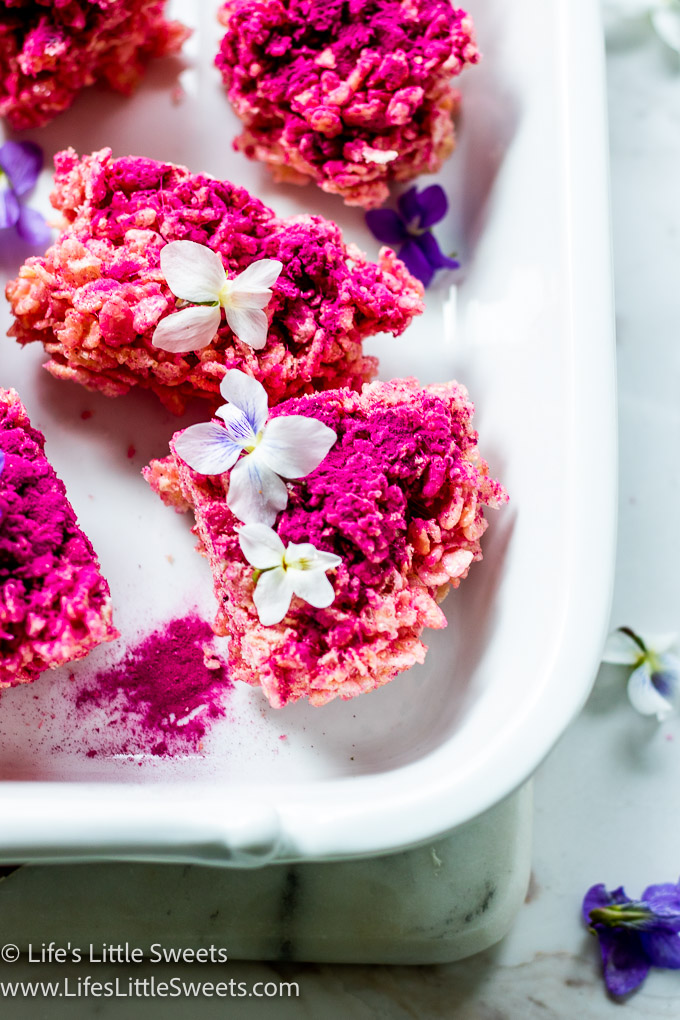 Pink Dragon Fruit Rice Krispies Treats in a white platter