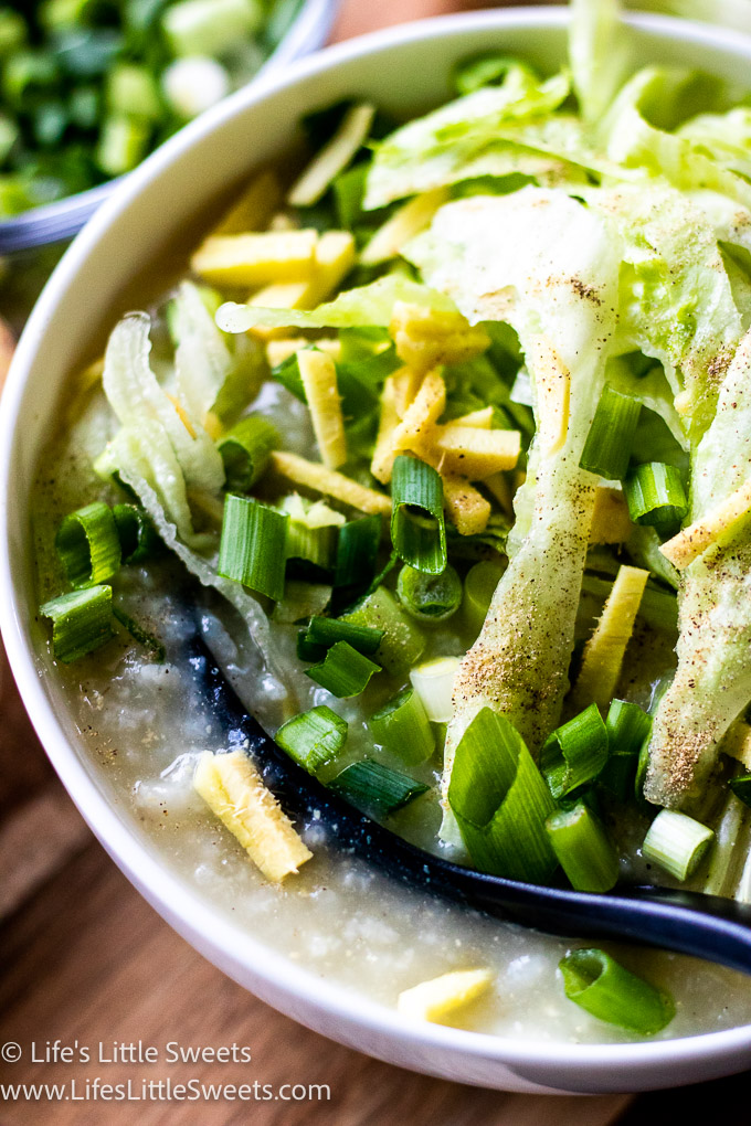 close up fresh ingredients over congee soup