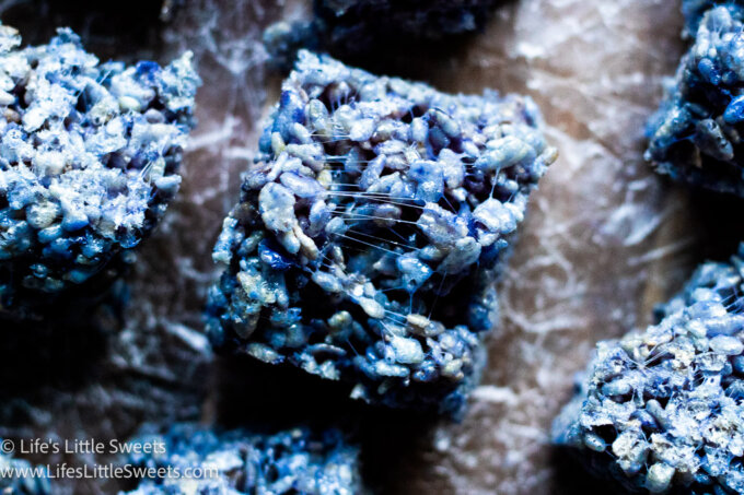 Blue Butterfly Pea Flower Rice Krispies Treats on parchment paper