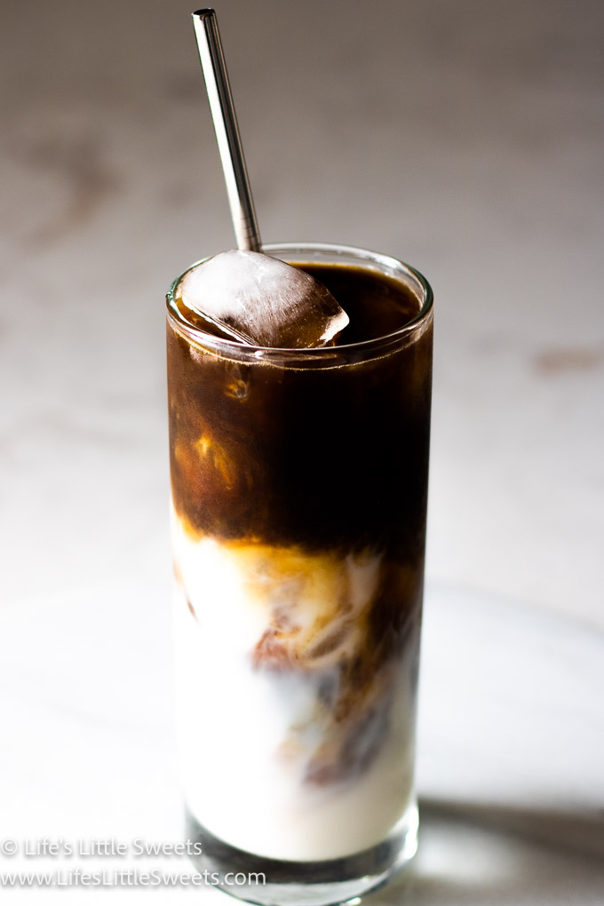 Iced Coffee with Almond Milk on a marble counter