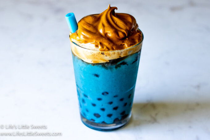 blue drink with boba and whipped coffee