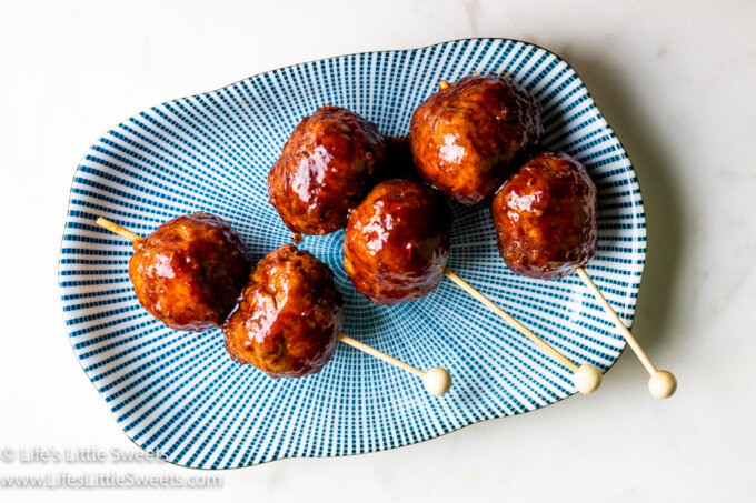 skewered meatballs on a serving dish