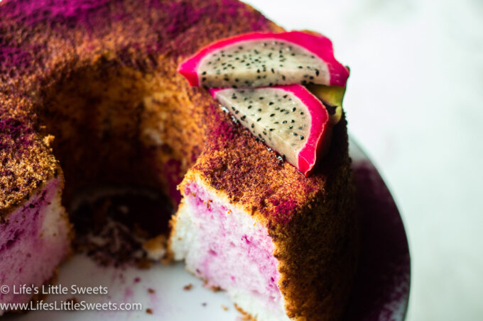 dragon fruit slices on top of an angel food cake
