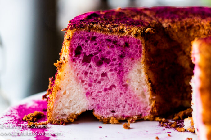 pink and white cake sliced