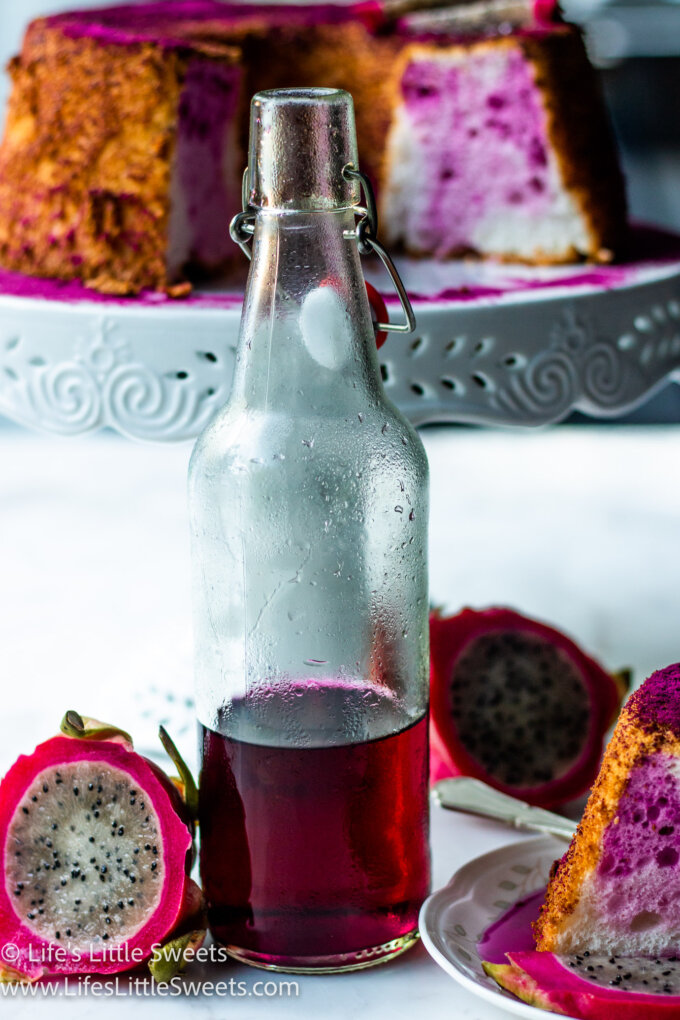 Dragon Fruit Simple Syrup with cake in the background