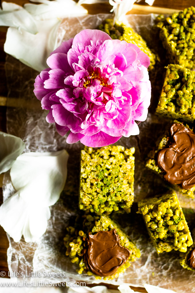 Matcha Rice Krispie Treats squares with chocolate and pink peonies