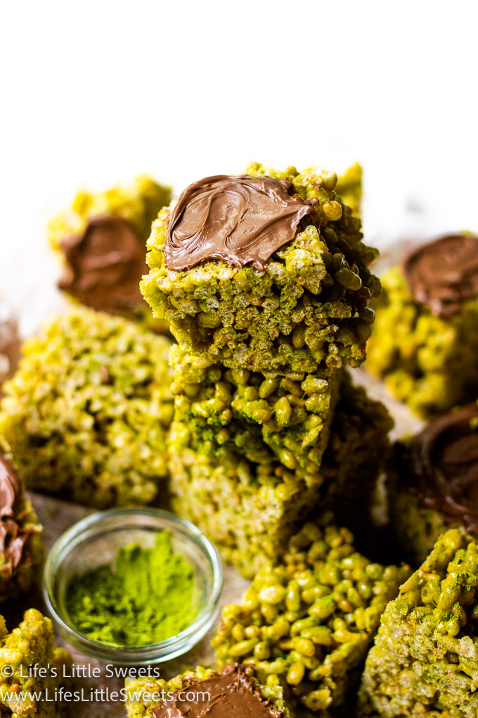 a stack of Matcha Rice Krispie Treats with chocolate