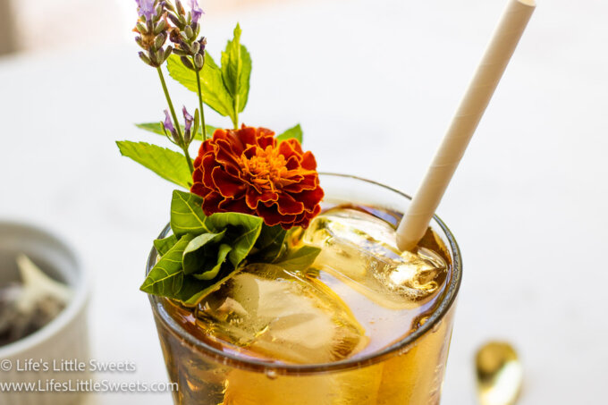 lavender and marigold flowers with iced tea