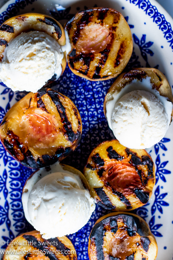 overhead view of grilled peaches and white vanilla ice cream