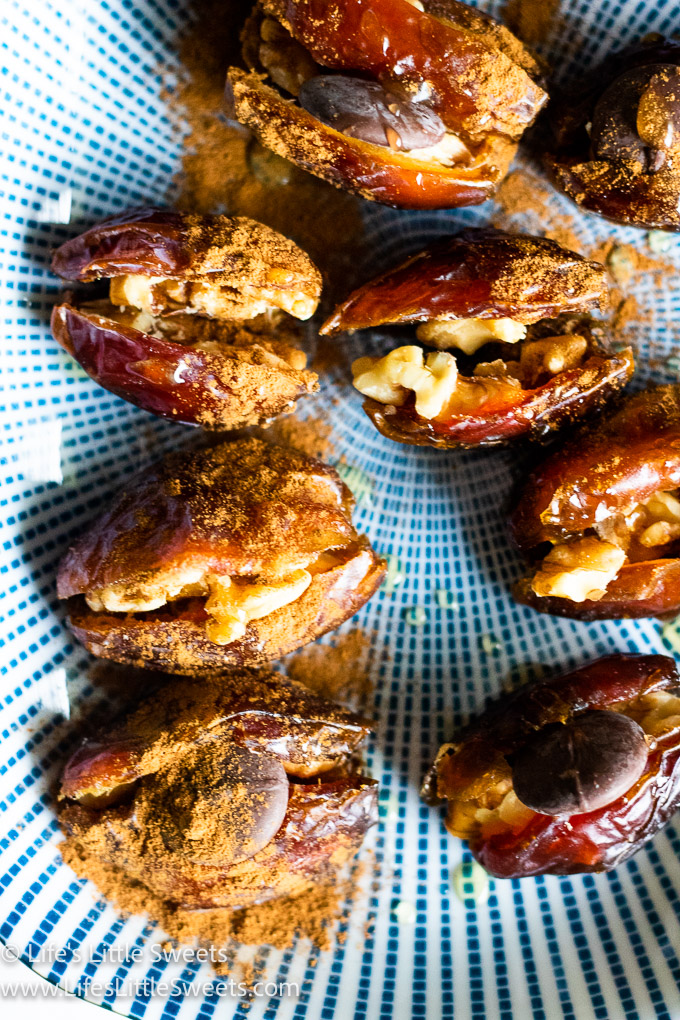 overhead view of stuffed dates on a blue striped plate