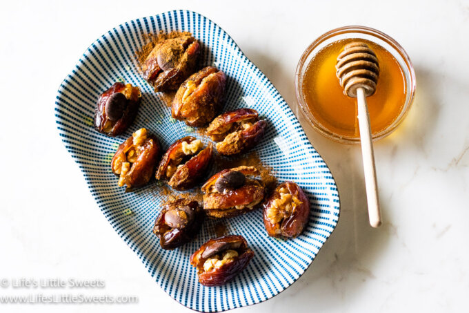 dates on a plate with honey