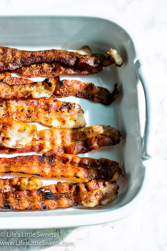 grilled bacon on a white serving platter